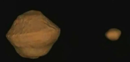 3D model binárneho asteroidu 1999 KW4, zobrazujúci rovníkovú výduť a mesiačik, ktorý sa pravdepodobne od primárneho telesa uvolnil v dôsledku odstredivej sily, ktorá narástla po zrýchlení rotácie primáru v dôsledku YORP efektu.